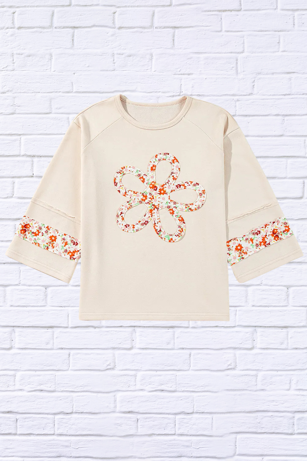 Exposed Seam Slit Floral Round Neck Blouse