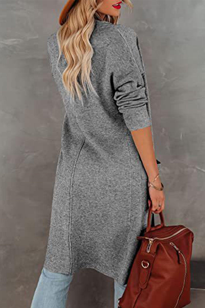 Vêtements d'extérieur élégants et unis pour étudiants, avec col en V et poches.