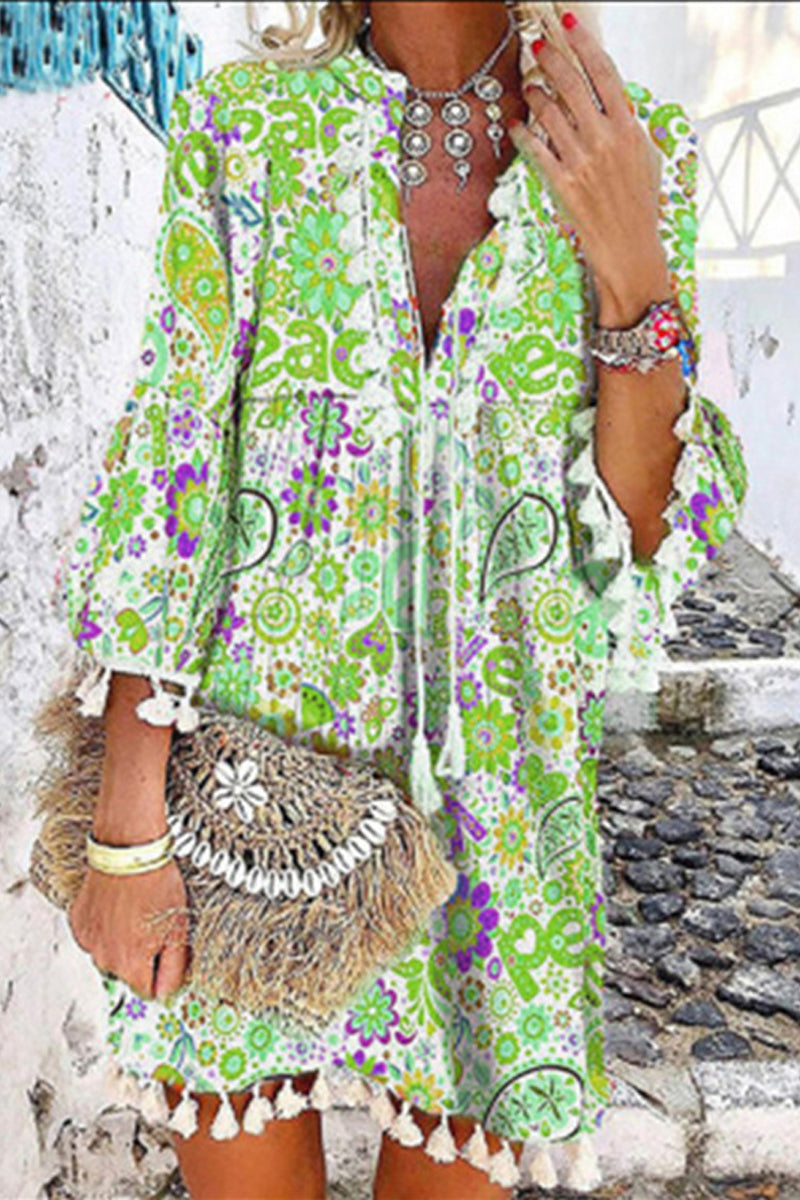 Robes-jupes portefeuille à imprimé décontracté, avec col en V et franges.