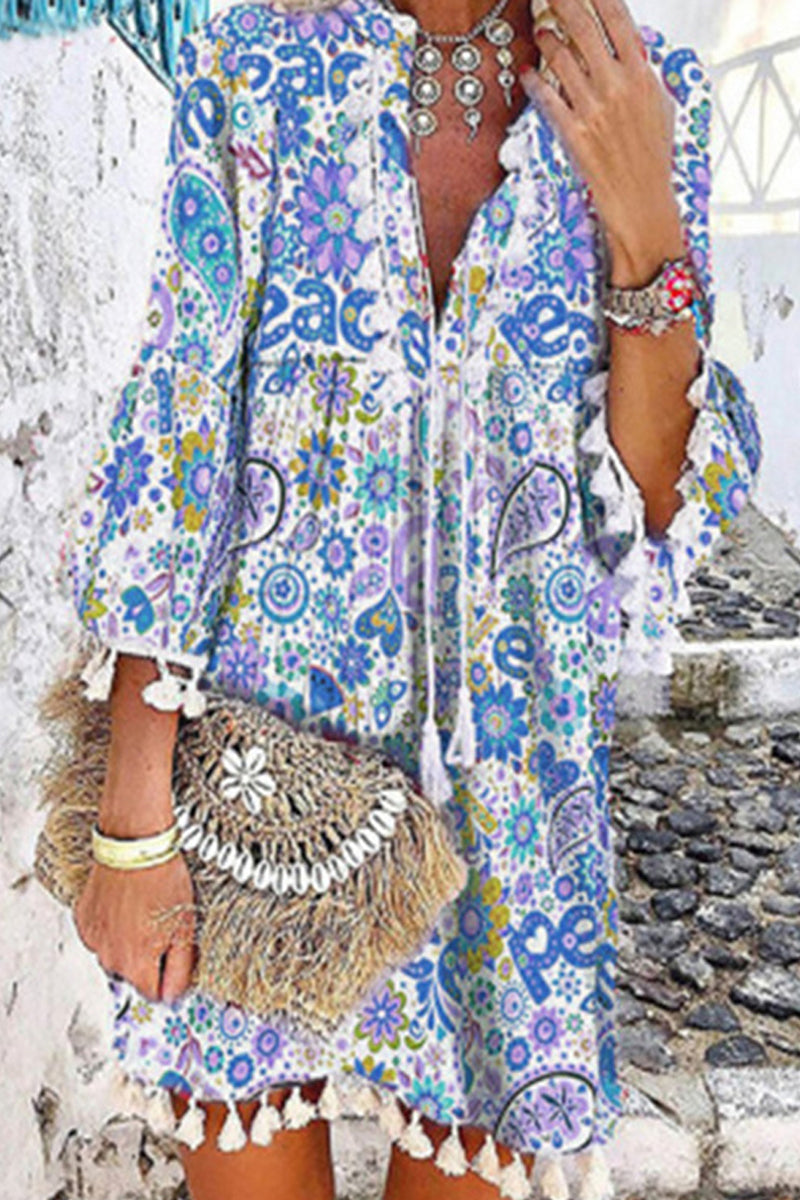 Robes-jupes portefeuille à imprimé décontracté, avec col en V et franges.