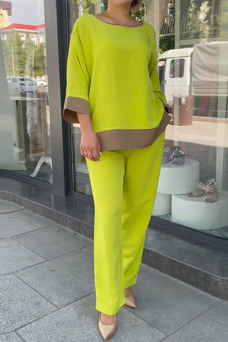 Ensemble deux pièces, style streetwear, coupe simple, blocs de couleur, poches, col rond, manches 9/10.