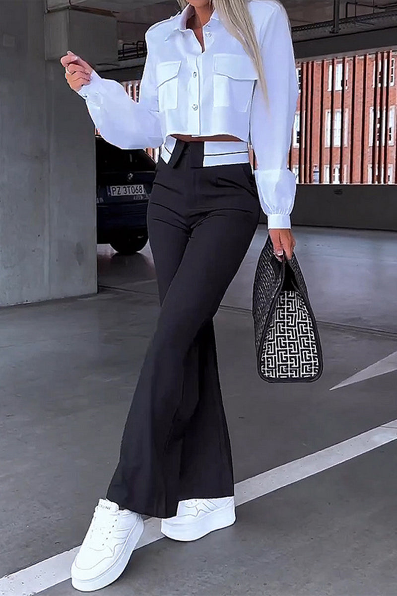 Ensemble deux pièces élégant et sobre pour le travail, avec col montant, manches longues et poches.