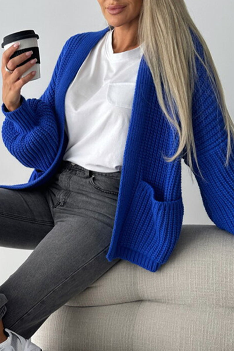 Vêtements d'extérieur élégants, unis, avec poches et col en V.