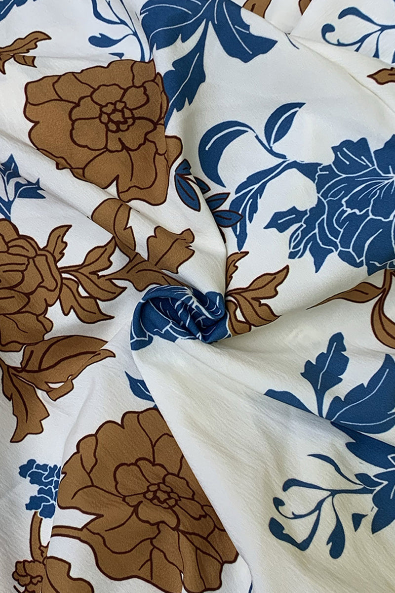 Ensemble trois pièces décontracté à manches courtes, col montant et poches à motifs floraux.