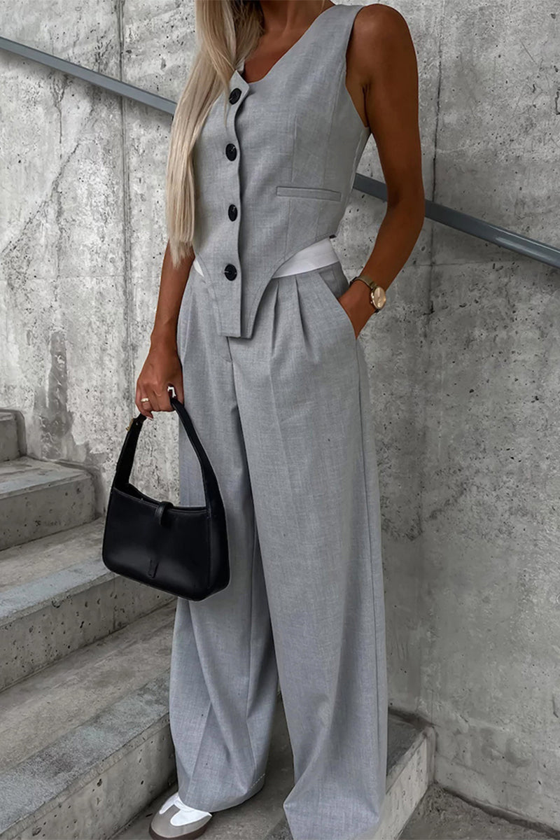 Ensemble deux pièces décontracté, style britannique, sans manches, avec poches, col en V et boucle.