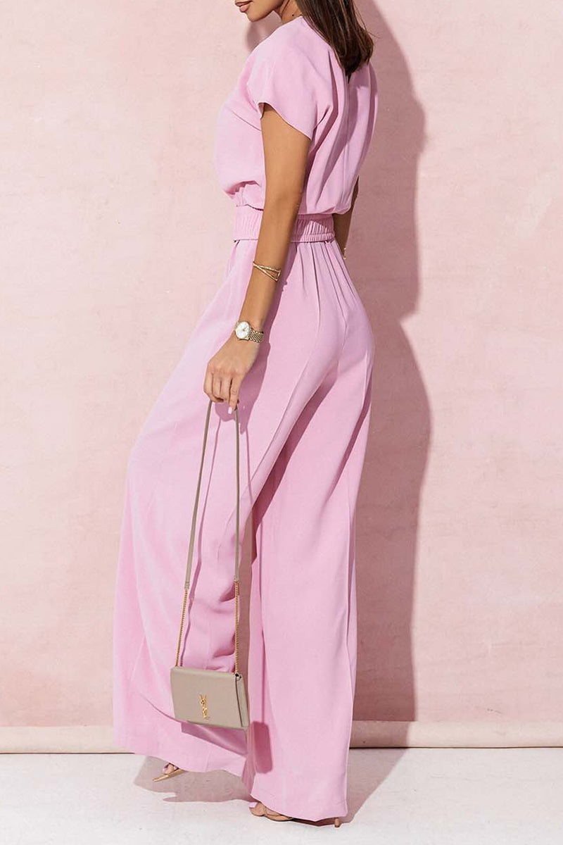 Combinaisons amples décontractées à col en V, décorées d'accessoires métalliques.