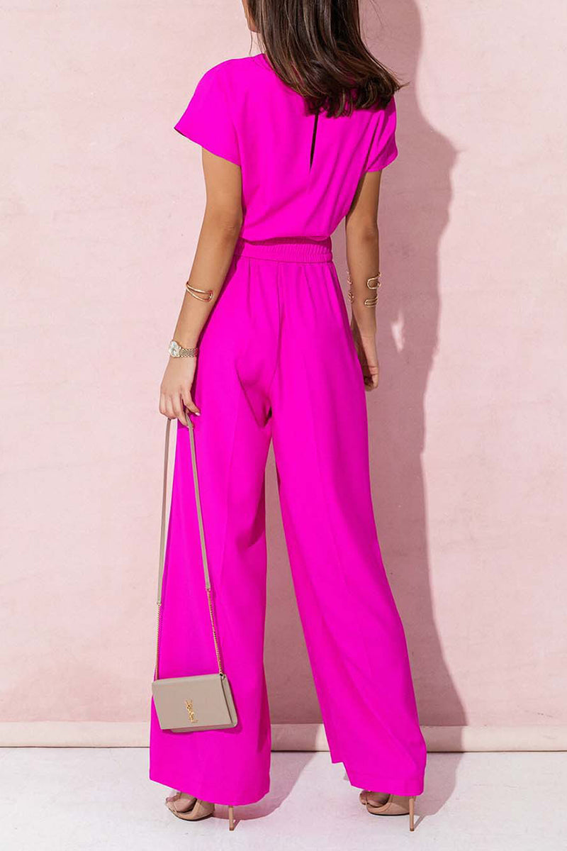 Combinaisons amples décontractées à col en V, décorées d'accessoires métalliques.