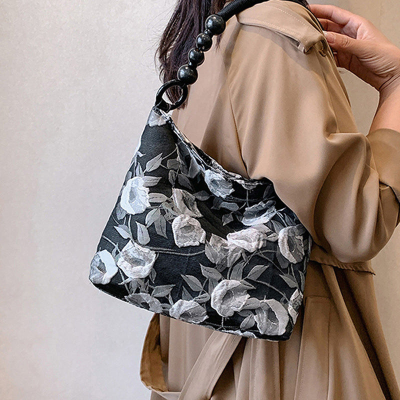 Sacs à main vintage élégants, brodés de fleurs et de perles, pliables.