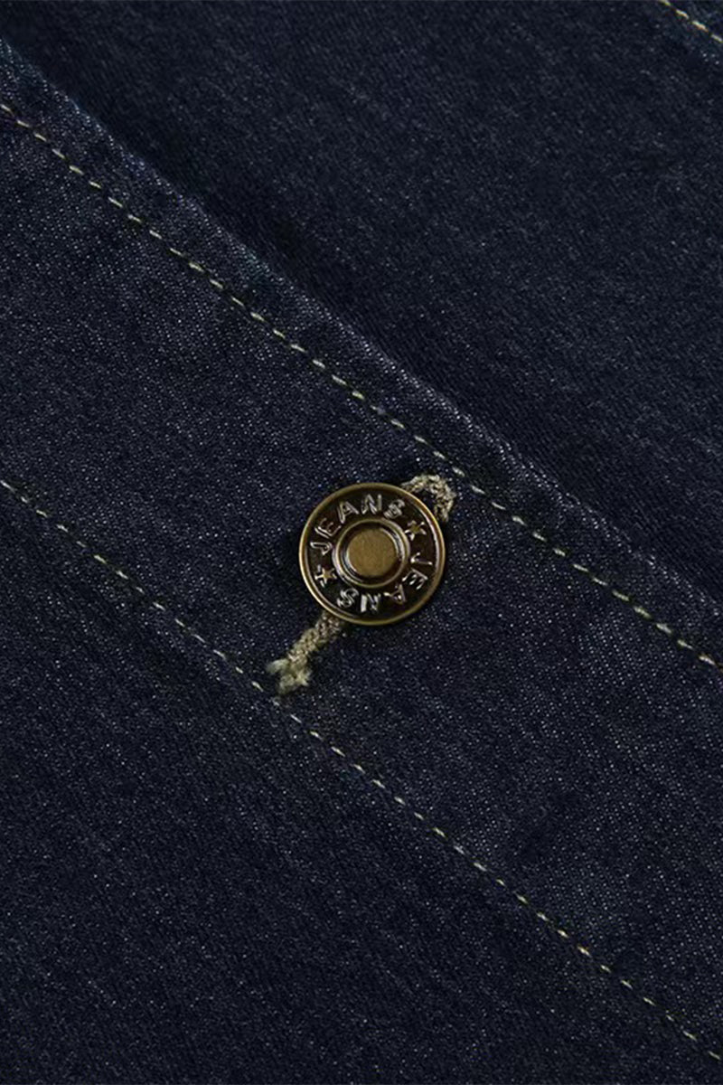 Veste en jean délavée, casual, sans manches, col en V, poches et boutons.