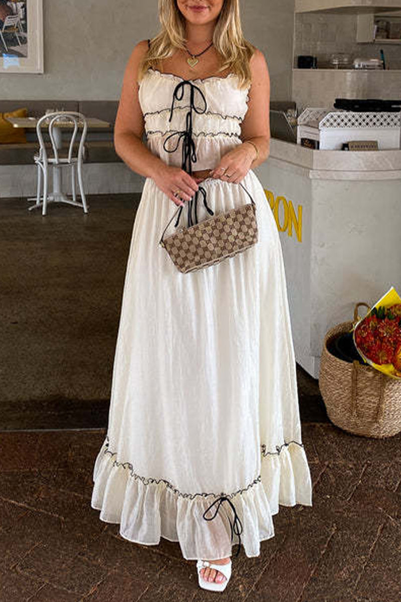 Ensemble deux pièces, élégant et doux, uni, avec pliage et nœud, décolleté en U, sans manches.