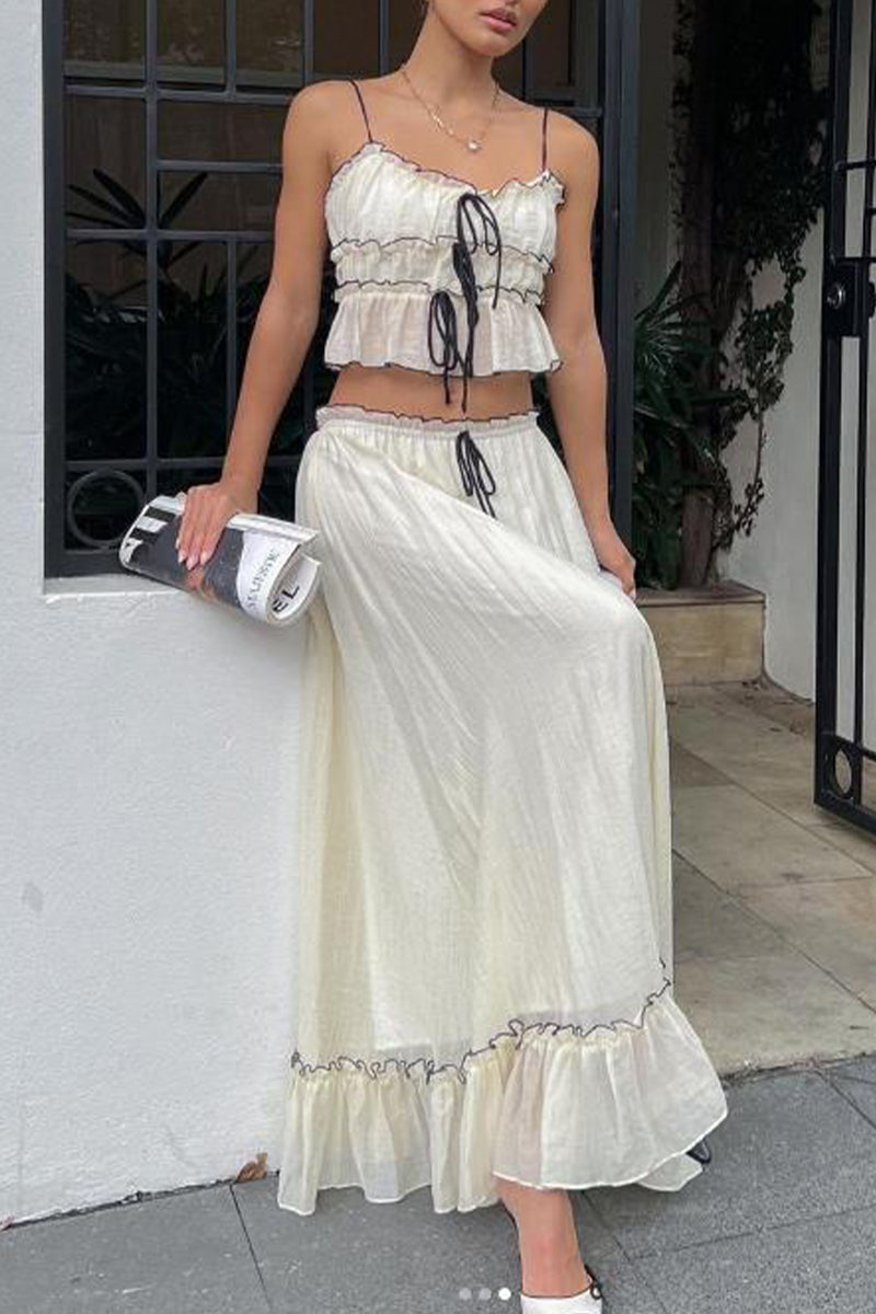 Ensemble deux pièces, élégant et doux, uni, avec pliage et nœud, décolleté en U, sans manches.