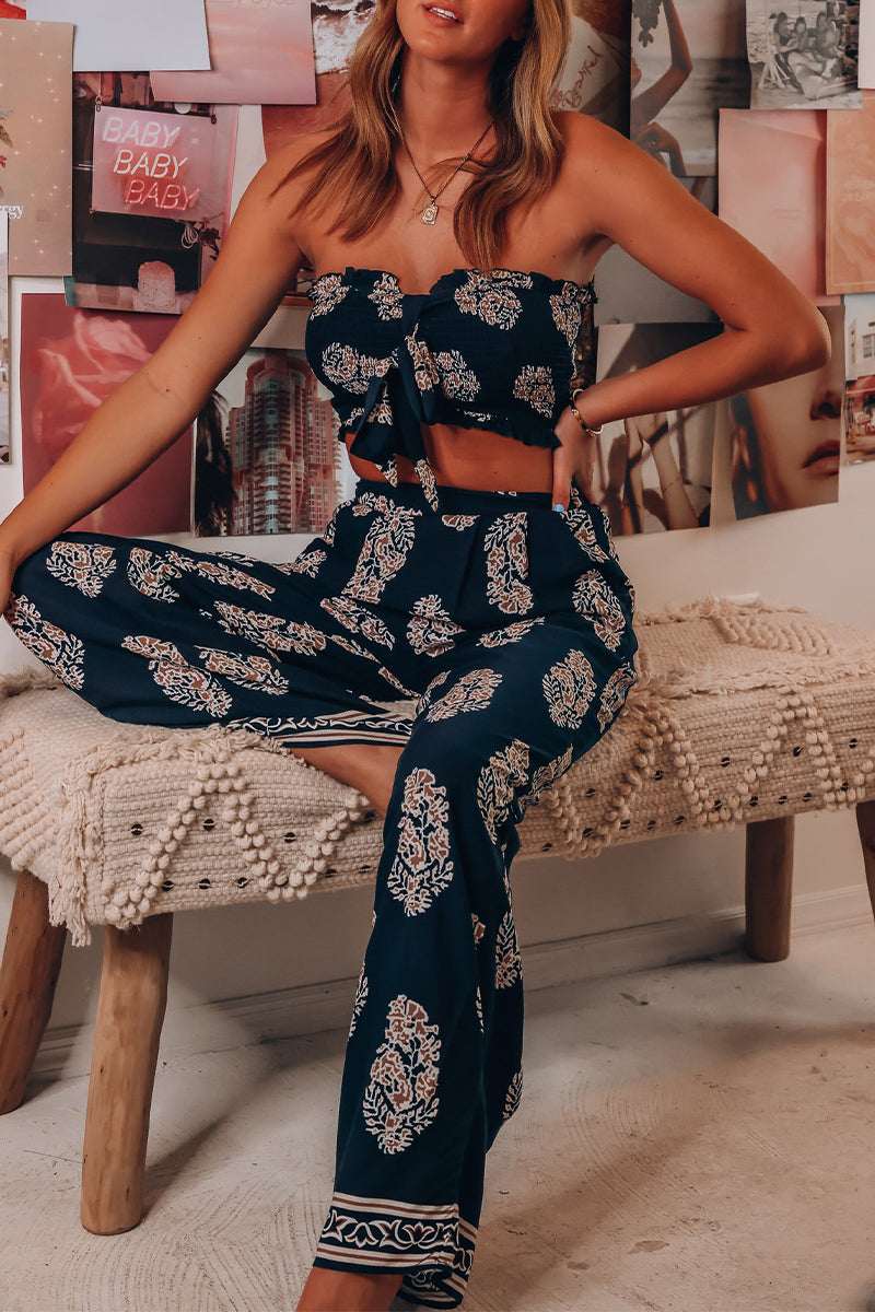 Ensemble deux pièces décontracté à fleurs, avec poches et nœud, sans bretelles et sans manches.