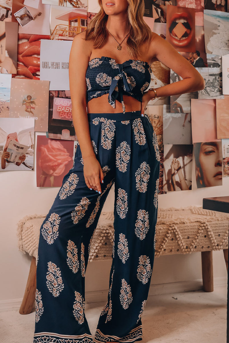 Ensemble deux pièces décontracté à fleurs, avec poches et nœud, sans bretelles et sans manches.