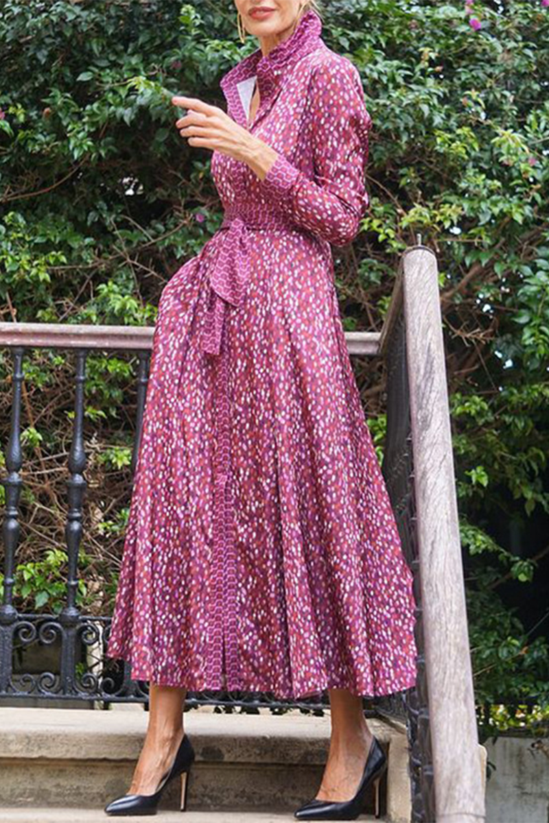 Robe A-line élégante et décontractée à pois, avec poches, lacets et col montant.