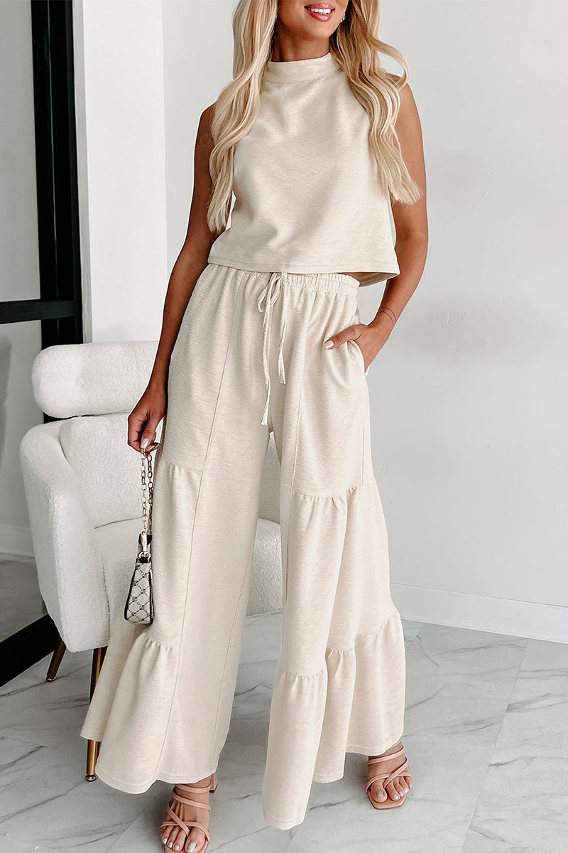 Ensemble deux pièces décontracté, uni, à col montant, sans manches, avec poches et volants.