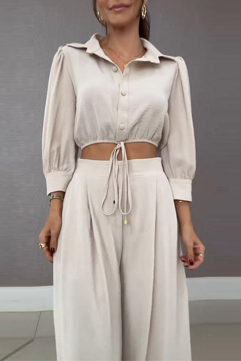 Ensemble deux pièces décontracté à porter au quotidien, avec col montant à lacets et manches longues.