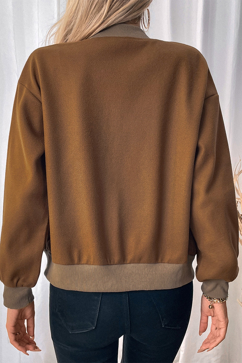 Vêtements d'extérieur décontractés à col rond avec boutons et poches.