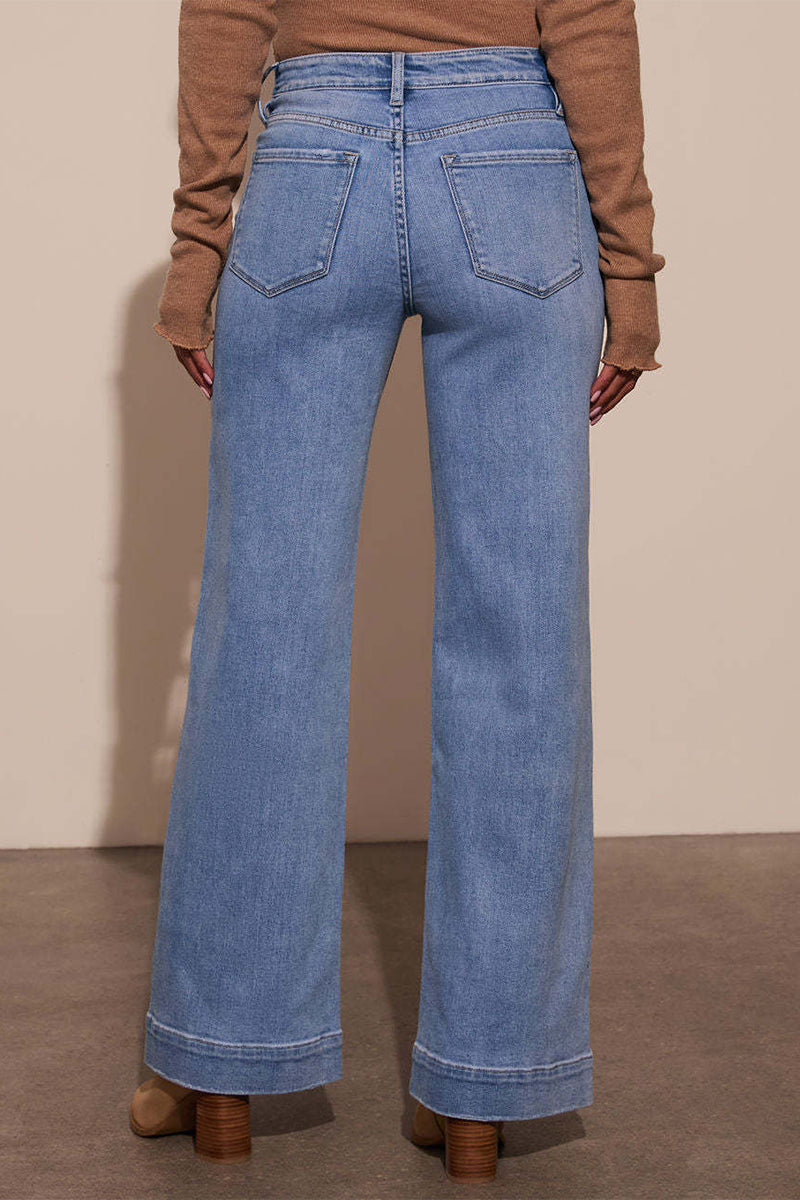 Jeans en jean délavé, taille haute, coupe ample, avec poches, style décontracté.