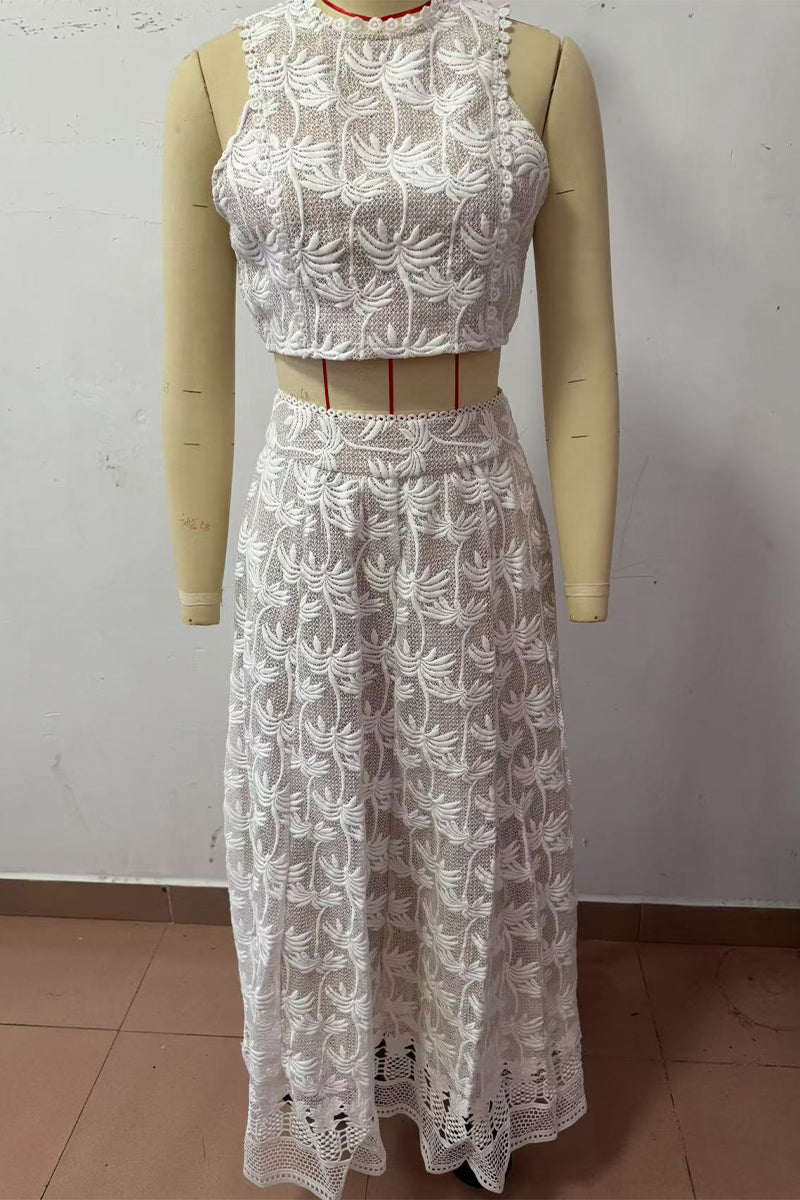 Ensemble deux pièces décontracté, brodé de fleurs, avec poches, fermeture éclair, col rond et sans manches.