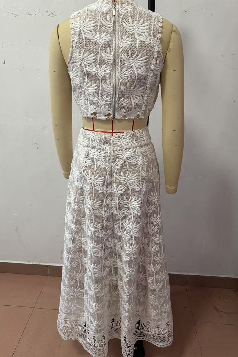 Ensemble deux pièces décontracté, brodé de fleurs, avec poches, fermeture éclair, col rond et sans manches.