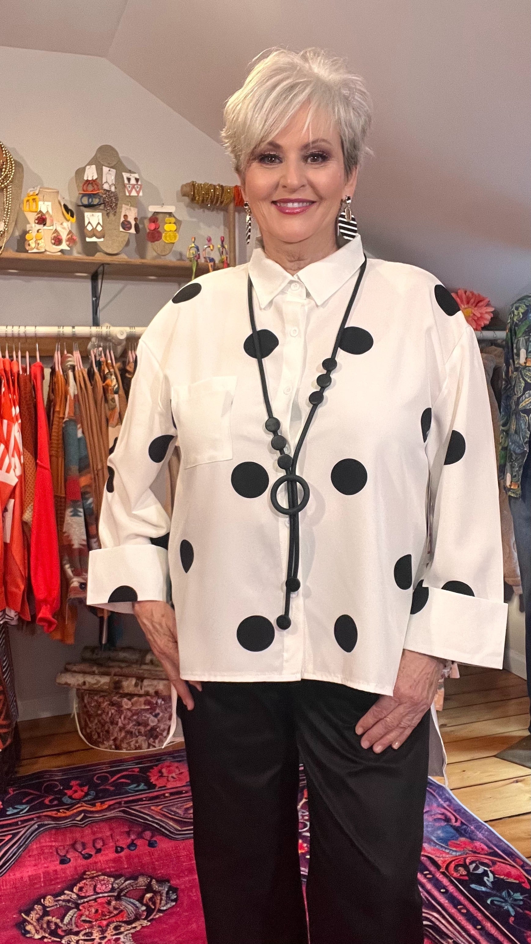 Polka Dot Perfection: Collared Button-Through Blouse with High-Low Hem